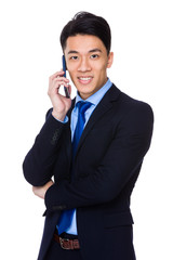 Asian businessman talk to mobile phone
