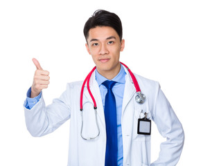 Male doctor with thumb up gesture