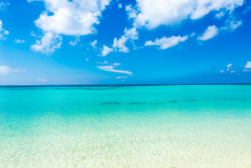 Fototapeta na wymiar Blue sky and the emerald green sea, Okinawa, Japan
