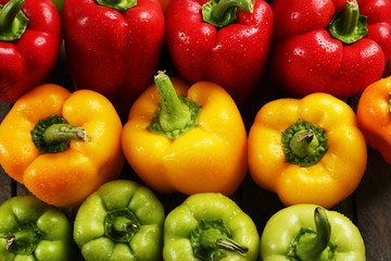 Group of wet colorful peppers, closeup