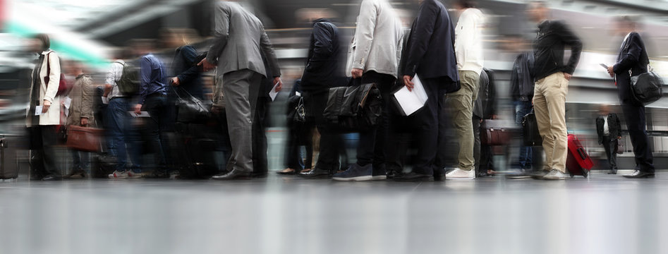 People Waiting In Line, Travellers In Queue