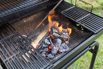 Fire in barbecue grill