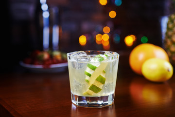 glass of delicious alcoholic cocktails or lemonade with ice and