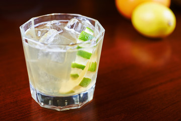 glass of delicious alcoholic cocktails or lemonade with ice and