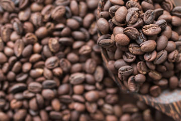 wooden spoon with coffee beans