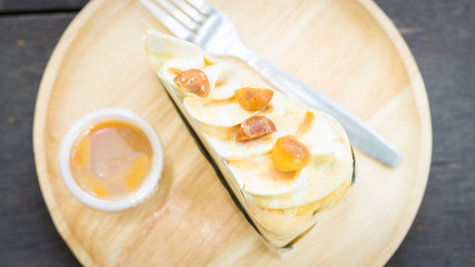 Caramel crape cake with macadamia