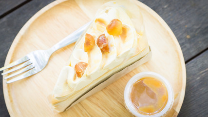 Caramel crape cake with macadamia