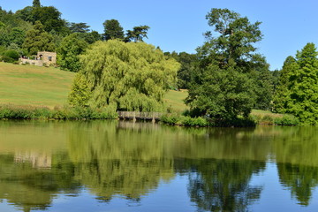 Fototapeta na wymiar A lake at an English country estate in August,