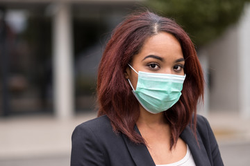 Afro-American Businesswoman Wearing Health Mask