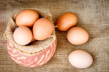 Raw egg put on old sack