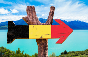 Belgium Flag wooden sign with river on background