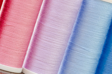multicolored sewing threads background