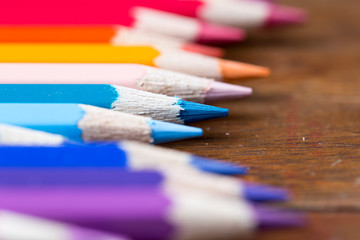 Fototapeta premium color pencils on wooden table