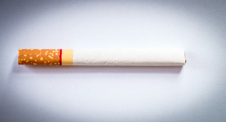 A cigarette on white background