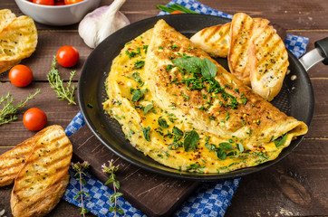 Herb omelette with chives and oregano sprinkled with Herb omelette with chili flakes - 88810640