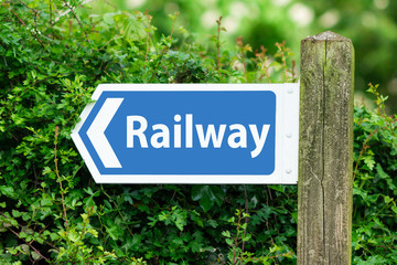 Direction Arrow, Sign To Railway in Blue Color