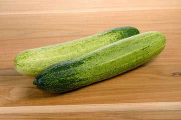 Fresh cucumber on wood table