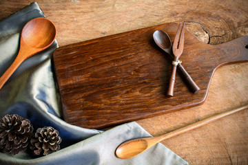 wooden utensil in kitchen on old wooden background