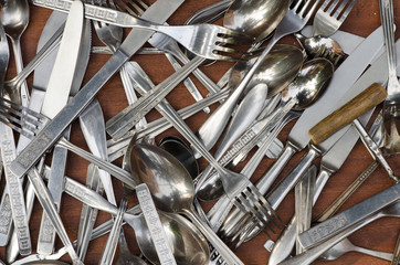 cutlery in wooden drawer