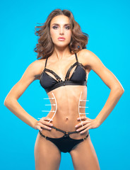 Breast augmentation and reduction in waist are shown in the body of the girl