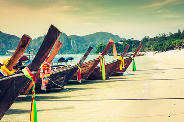 Fototapeta premium Long boat and tropical beach, Andaman Sea,Phi Phi Islands,Thaila