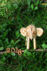 Happy New Year 2016 concept, elephant rattan handmade and wood number idea