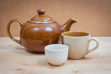 kettle on wooden table,vintage style
