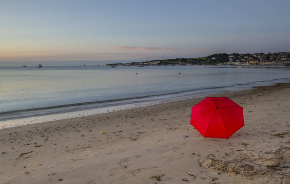 Dawn At Beach With Red Umbrella