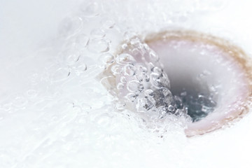 turbulent bubbly flow of water in the sink