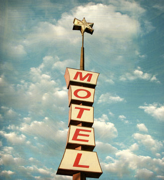 aged and worn vintage motel sign