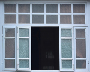 Large windows on the old European-style buildings.