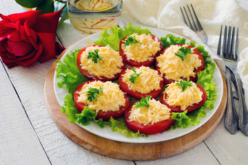 Snack cheese salad on slices of tomato