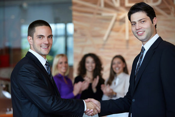 Business people shaking hands