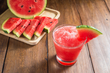 watermelon smoothie on wooden background