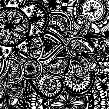 Black and white ornate hand drawn doodles with paisleys and