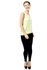 Casual pose of shy woman.