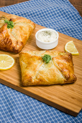 Pastry wrapped salmon filelt with lemon