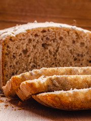 Sliced whole wheat bread on cutting board