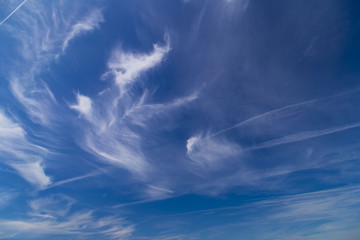 Daytime sky with cirrus and stratus clouds - obrazy, fototapety, plakaty