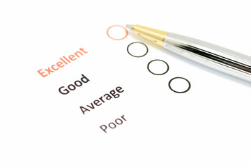 customer satisfaction survey form with the pen