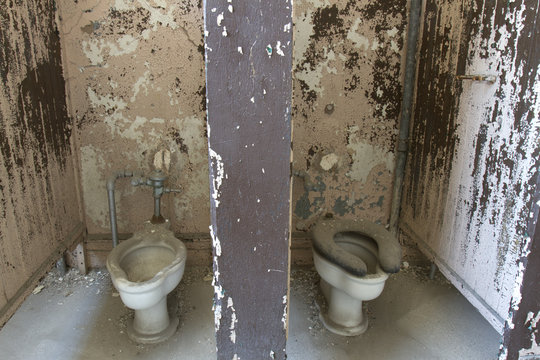 Dirty, decaying toilet stalls