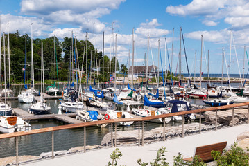 Fototapeta na wymiar Marina with sailboats under blue sky