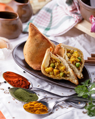 delicious sliced indian samosa
