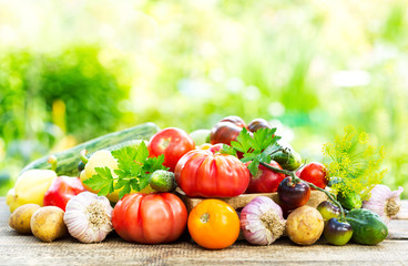 various fresh vegetables on wooden table