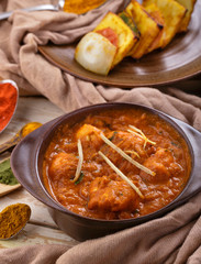 indian cuisine chicken tikka masala served with paneer tikka