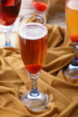 a glass of applelini