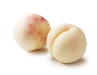 fresh white peach on white background © m________k____