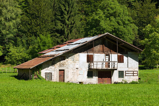 Typical Old Farmhouse - Trentino Italy. Typical old farm house with barn in mountain. Trentino Alto Adige, Italy