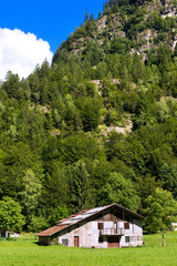 Typical Old Farmhouse - Trentino Italy. Typical old farm house with barn in mountain. Trentino Alto Adige, Italy