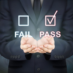 businessman holding evaluation checkbox